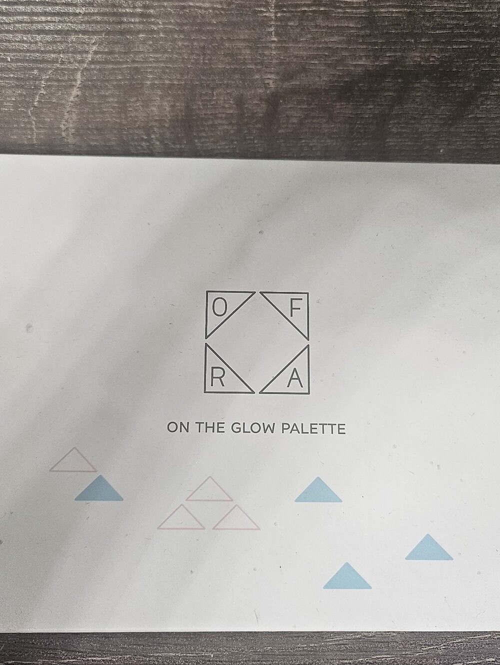 OFRA- On The Glow Palette - White with Blue & Pink Accents